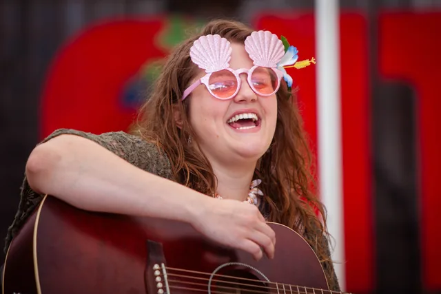 A singer caught in a joyful moment