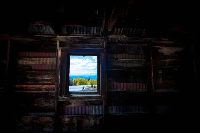 Autumn seen through a cabin window