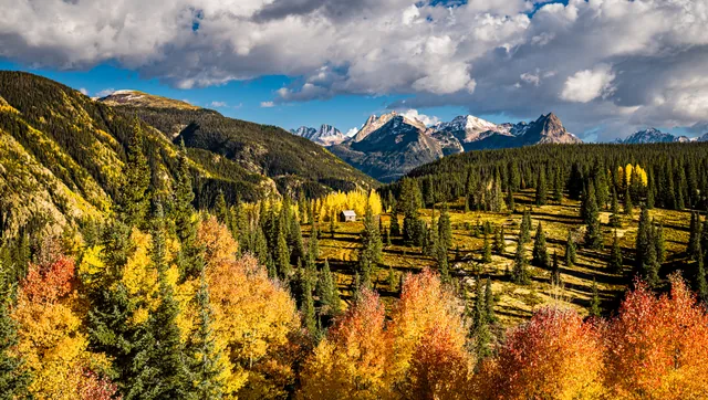 Autumn valley and storm clouds in the San Juans