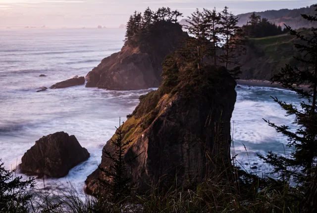 Coastal cliffs and soft surf