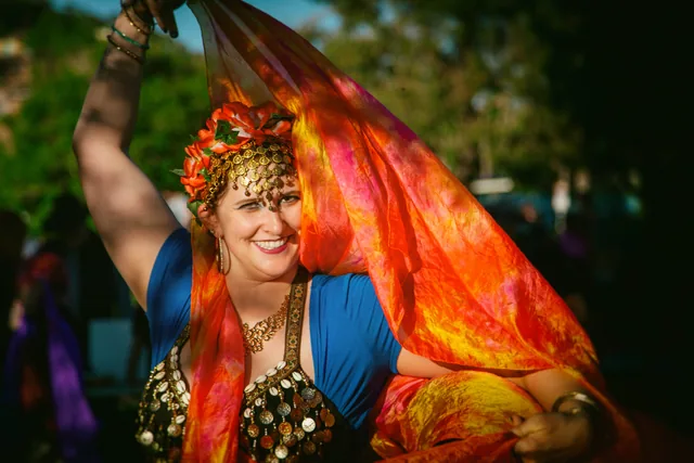 Dancer with a glowing orange veil