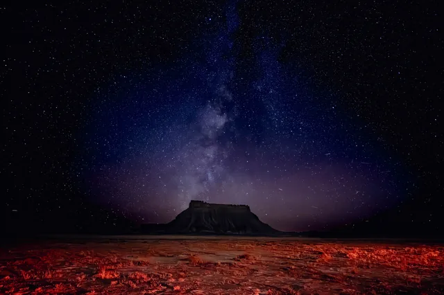 Milky Way rising above a desert mesa