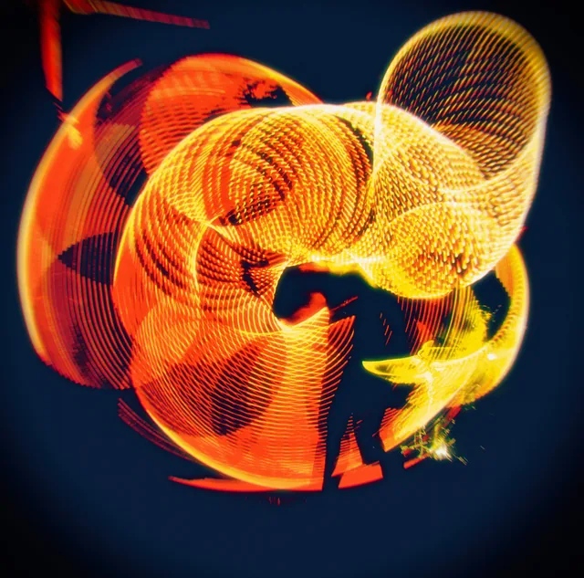Orange light flower and a silhouette