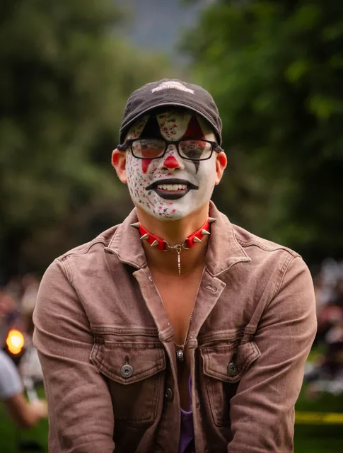 Painted face and a quiet smile