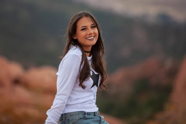 Portrait with a soft sandstone backdrop