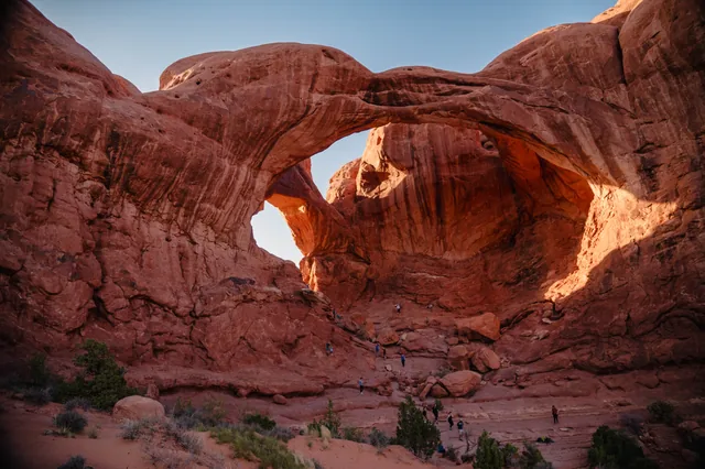 Sunlight inside a monumental sandstone arch